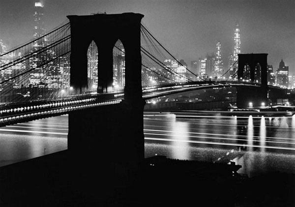 Brooklyn Bridge at night by Andreas Feininger.