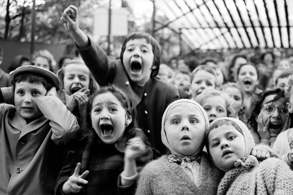 Children at puppet theater in Paris by Alfred Eisenstaedt.