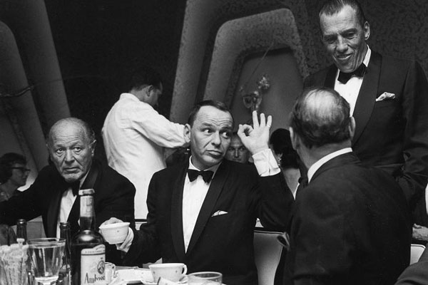 Frank Sinatra at a black tie affair by John Dominis