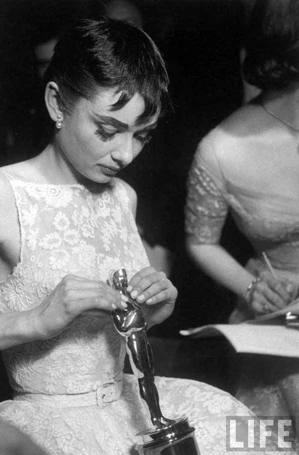 Audrey Hepburn wins Oscar for Roman Holiday in 1954. Photo by Ralph Morse.