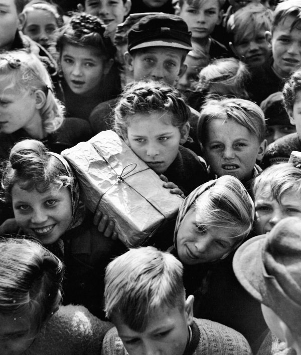 Children with gifts from the Berlin Airlift in 1948 by Hank Walker.