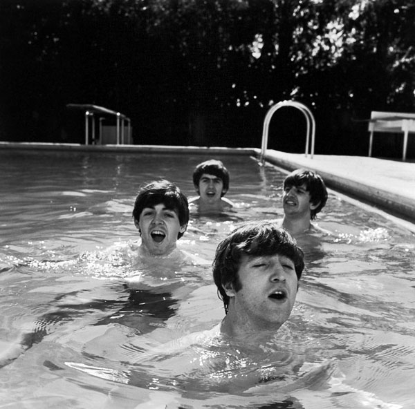 The Beatles take a dip in a Miami Beach pool, photo by John Loengard.