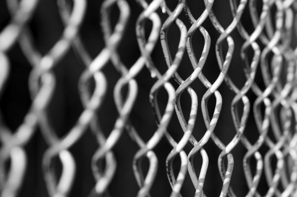 Chain link fence at night free image