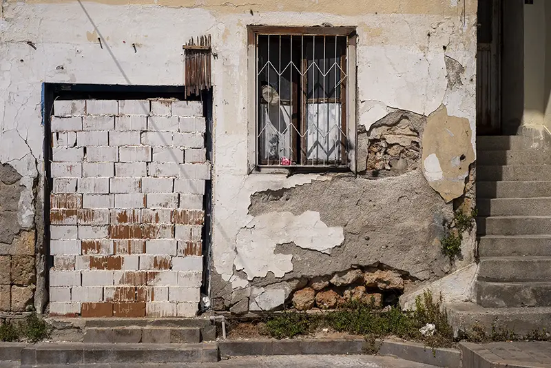 Bricks in doorway of an abandoned building in Antalya, Turkey, 2023.