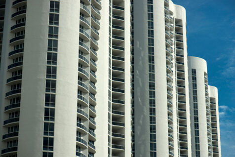 <a class="white" href="https://www.dropbox.com/s/0stl8fq9bjsthep/rounded-apartment-building.jpg?dl=1">Download High-Resolution Photo</a> Apartment building free stock photo