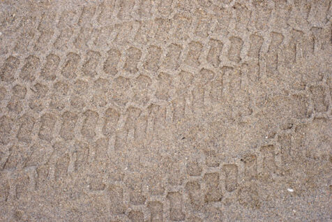 <a class="white" href="https://www.dropbox.com/s/ip9rcl87j3emvzy/tire-tracks-in-sand.jpg?dl=1">Download High-Resolution Photo</a> Tire tracks in sand free stock photo