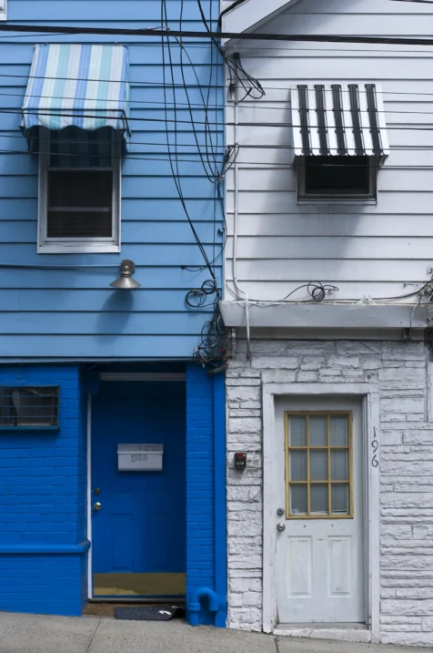 Contrasting blue and white apartments in Nyack, New York, 2014.