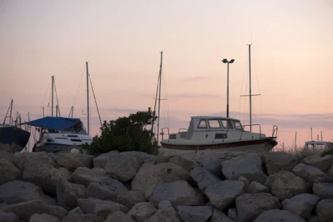 Boats in shipyard at dusk in Split, Croatia, 2019.
