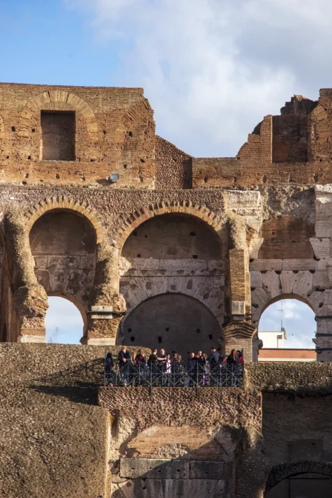 A crowd inside the Colosseum on a sunny day in Rome, Italy, 2022.