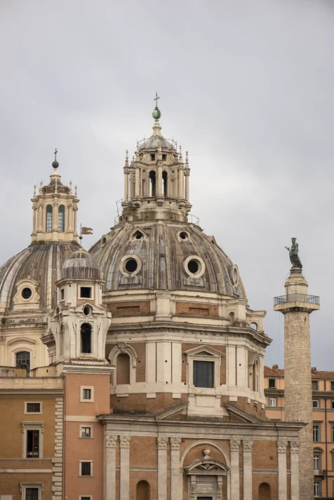 A domed church and statue in Rome, Italy, 2022.