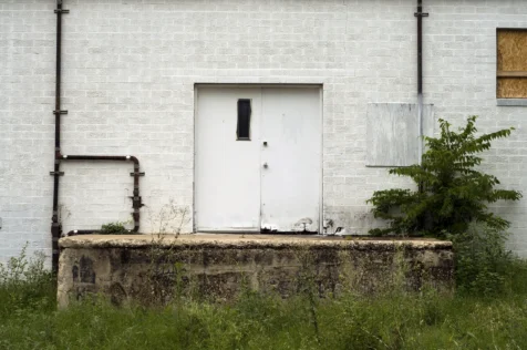 A door and platform of an industrial building in Austin, Texas, 2015.
