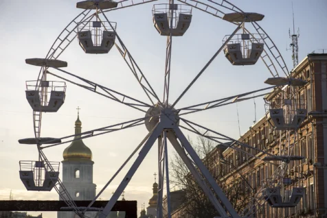 A ferris wheel on a sunny afternoon in Kyiv, Ukraine, 2019.