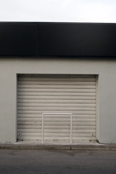 A garage and plastic barrier in Split, Croatia, 2019.