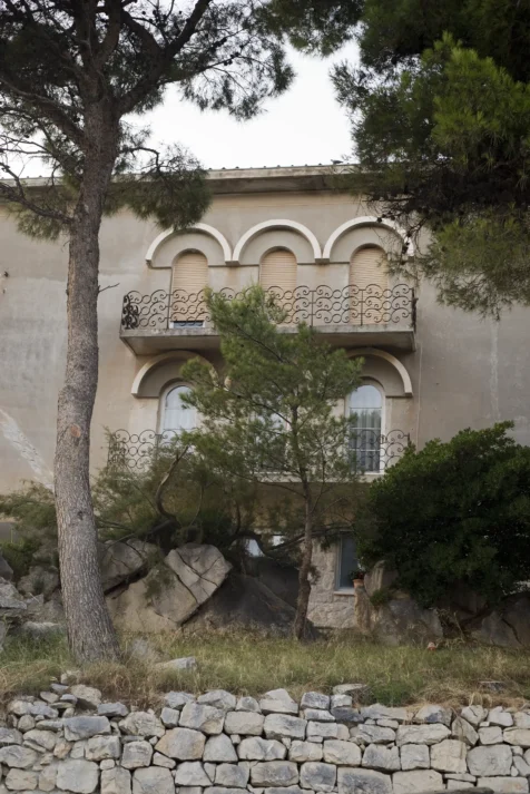House and trees near the beach in Split, Croatia, 2019.