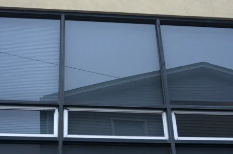 A house reflection in windows in Nyack, New York, 2014.