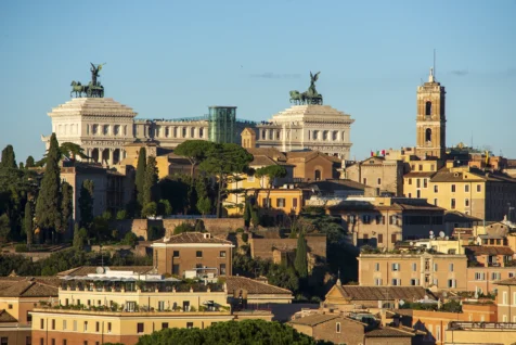 Il Vittoriano and assorted buildings on a sunny day in Rome, Italy, 2022.