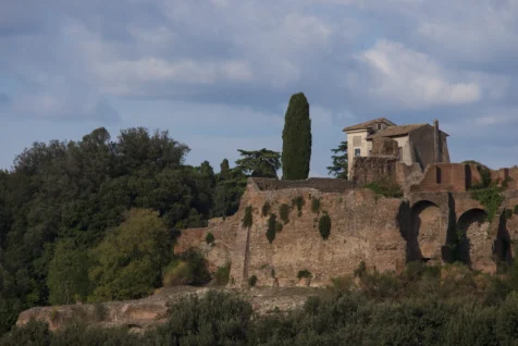 A lone building and trees on Palatine Hill in Rome, Italy, 2022.
