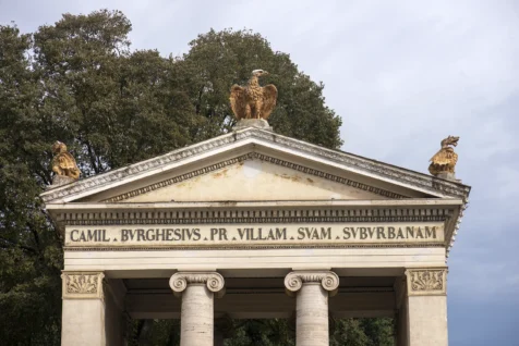 A monument with eagles at the entrance of the Villa Borghese in Rome, Italy, 2022.