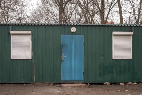 A multi-colored metal construction trailer at a park in Kyiv, Ukraine, 2020.