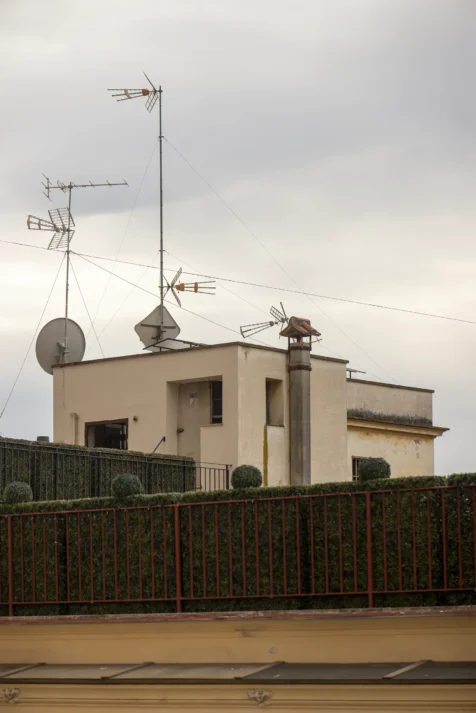 Rooftop antennas on a building near Piazza di Spagna in Rome, Italy, 2022.