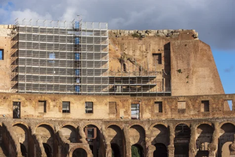 Scaffolding inside the Colosseum on a sunny afternoon in Rome, Italy, 2022.