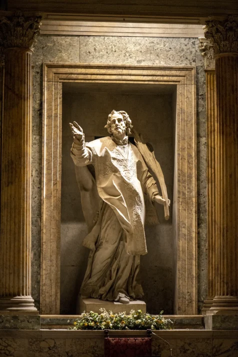 A framed sculpture of a man at the Pantheon in Rome, Italy, 2022.