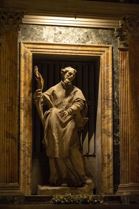 A framed sculpture of a man at the Pantheon in Rome, Italy, 2022.