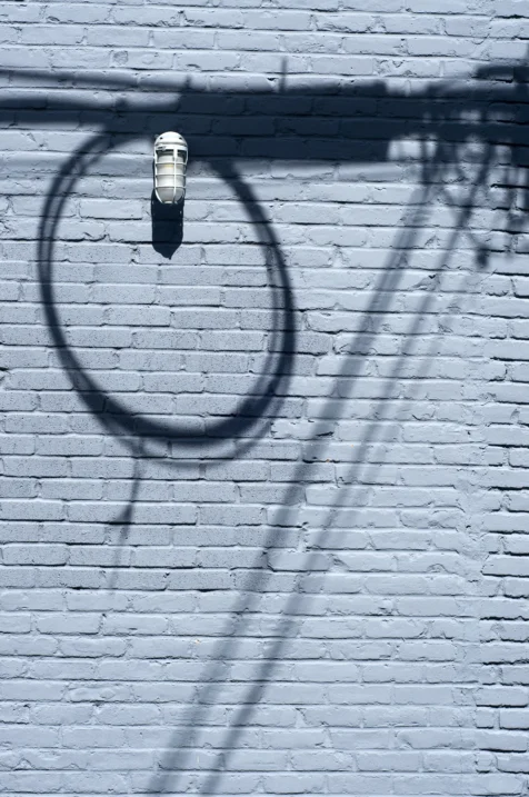 Shadows and light on a brick wall in Nyack, New York, 2013.