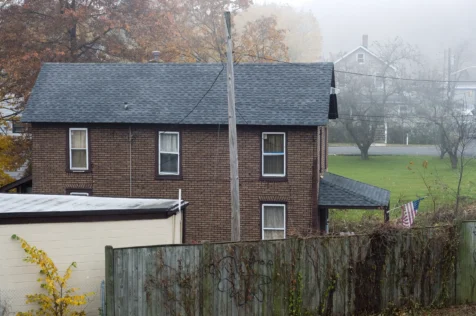 A suburban house near the New York State thruway in West Nyack, New York, 2011.