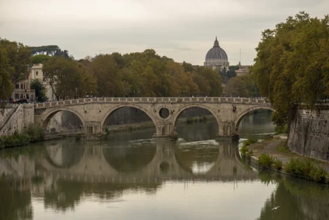 The Tiber River and St. Peter's Basilica in Rome, Italy, 2022.