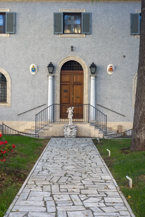 A walkway and building near the Basilica of St. Paul Outside the Walls in Rome, Italy, 2022.