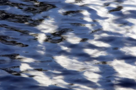 Abstract shiny reflections in the Hudson River near Nyack, New York, 2015.