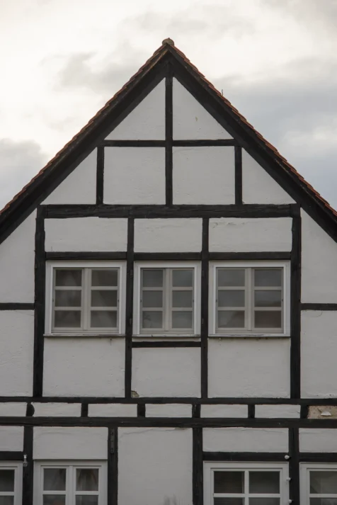 A black and white building at dusk in Ulm, Germany, 2023.