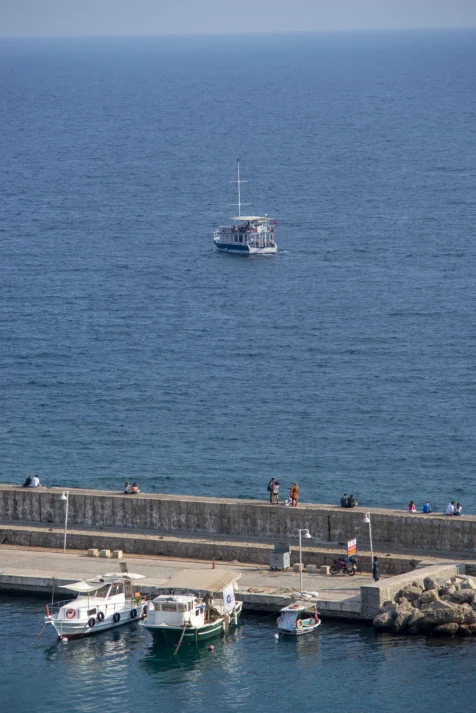 A boat heads out to sea from the port in Antalya, Turkey, 2023.