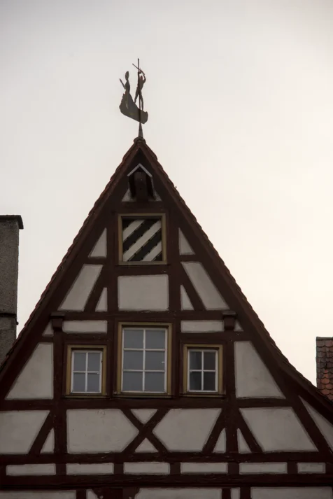 A brown and white building at dusk in Ulm, Germany, 2023.