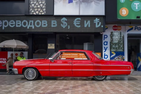 A classic Chevy Impala parked on the sidewalk in downtown Antalya, Turkey, 2023.