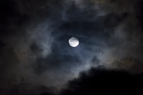 View of the moon on a cloudy evening in Valley Cottage, New York, 2013.