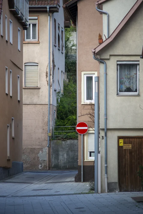 A do not enter sign among houses in Geislingen an der Steige, Germany, 2023.