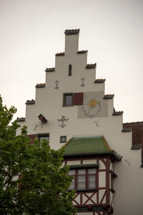 A funky white building and tree at dusk in Ulm, Germany, 2023.