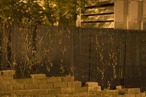 A generator, fence and some bricks at night in Nyack, New York, 2015.