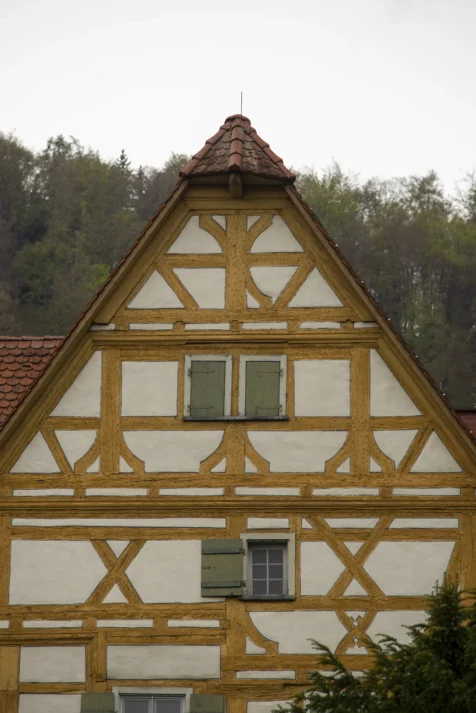 A gold and white house in Blaubeuren, Germany, 2023.