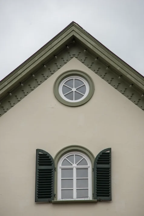 A green building on an overcast day in Blaubeuren, Germany, 2023.