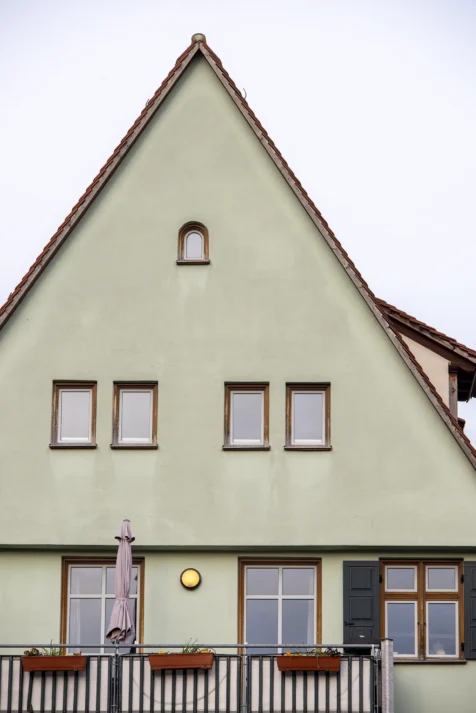 A light green building in Ulm, Germany, 2023.