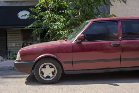 An old red Fiat in Antalya, Turkey, 2023.