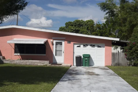 A pink house on a pleasant day in Port Saint Lucie, Florida, 2016.