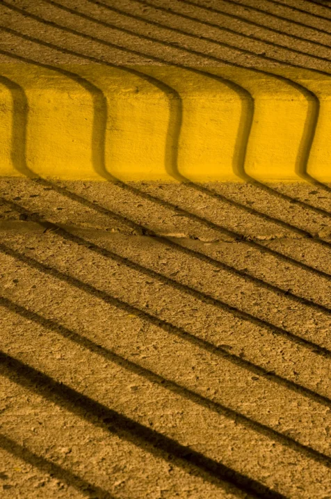 Railing shadows on concrete at night in Valley Cottage, New York, 2013.