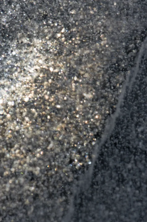 Abstract view of glistening ice in Greenwood Lake, New York, 2014.