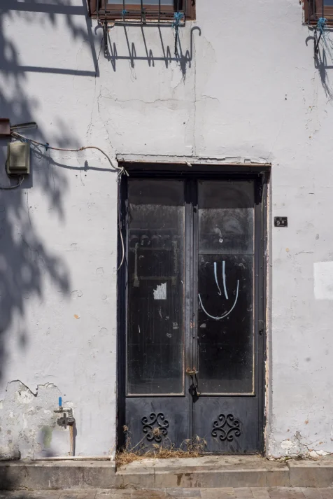 A smiley face on a door in Old Town, Antalya, Turkey, 2023.