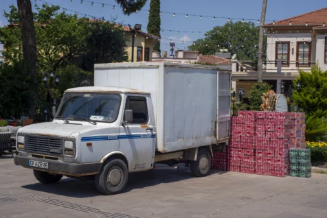 An old truck delivers soda to a club in Antalya, Turkey, 2023.