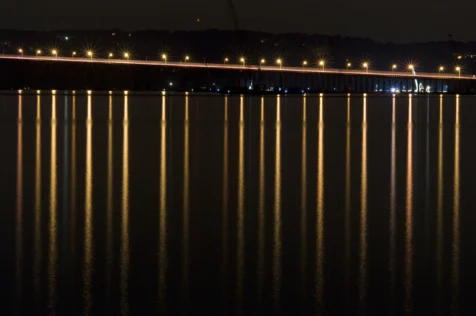 Tappan Zee Bridge streetlights reflected in the Hudson River at night, 2015.
